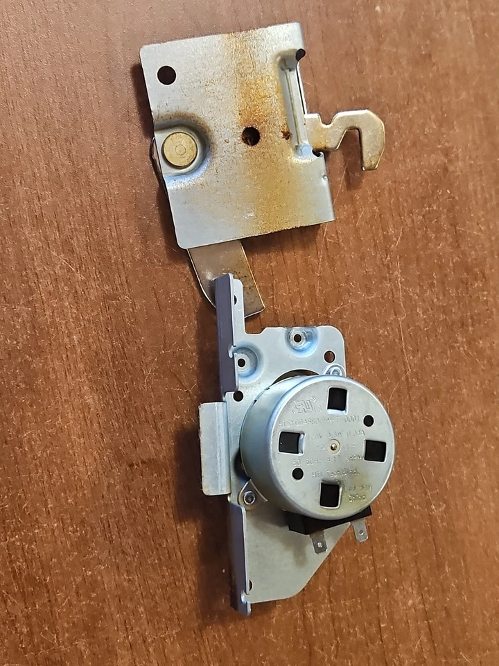 Whirlpool Range Door Latch & Motor   –   WPW10107820    WP9761013   *used*