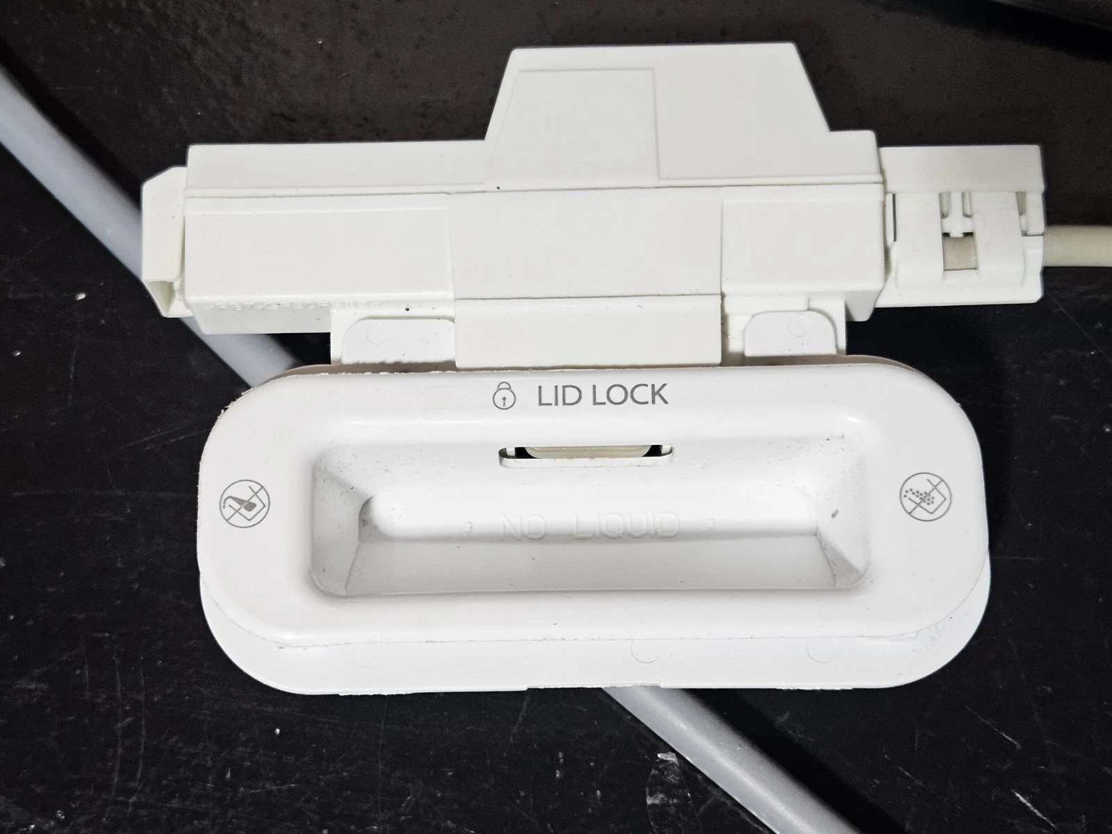 Whirlpool Washer Lid Lock  –   W10810403  *used*